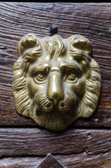 Heurtoir de porte avec une tête de lion