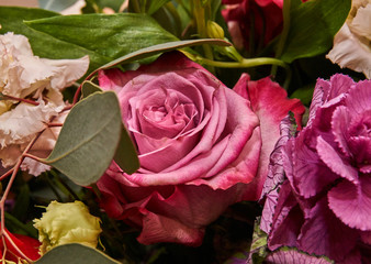 rosebud in a bouquet of flowers