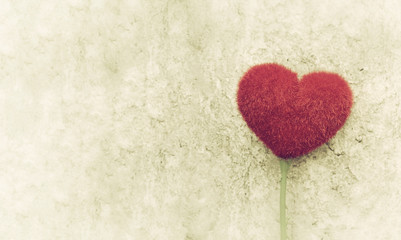 Love concept: red heart shape with cement background