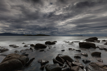 Shore scape in scotland with dramatic lighting