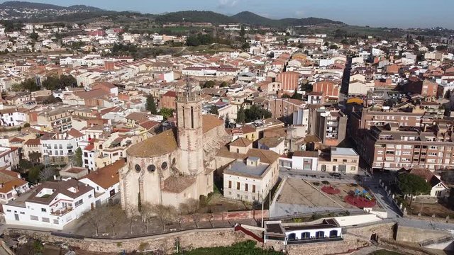 Aerial view of Caldes de Montbui and its church Santa Maria. Medieval roman village in Catalonia, Spain.