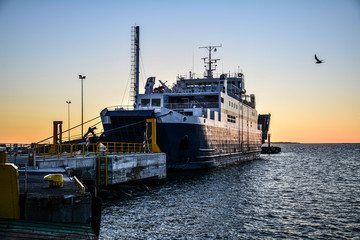 Ship standing in a pier in sunset light in Tallinn