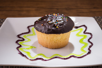 cupcake with frosting and sprinkles