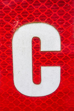 Written Wording in Distressed State Typography Found Letter C