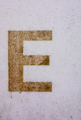Written Wording in Distressed State Typography Found Letter E 