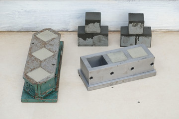 Small sample cube non-shrink concrete for testing strength of concrete - obrazy, fototapety, plakaty