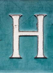 Written Wording in Distressed State Typography Found Letter H
