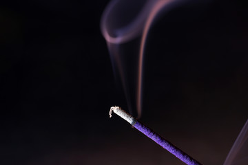 Smoke flashed with colorful foils and photographed in the studio