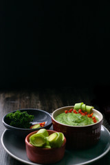 Smoothie recipe with green vegetables, avocado and kale salad