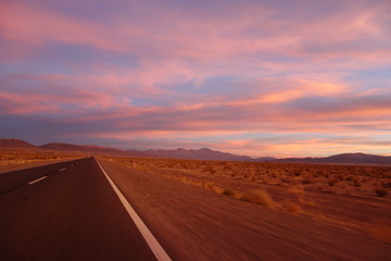 Fototapeta na wymiar Magical sunset on the roadway to Salinas grandes (large salines) on the north of argentina