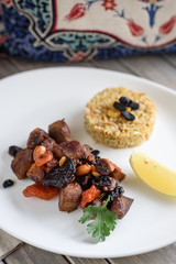 Turkish Lamb Meat, Dried Fruit and Almond Stew with Bulgur as Side Dish, Kuzu Mutancana.