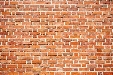 Yellow brick brick wall. Can be used as background.