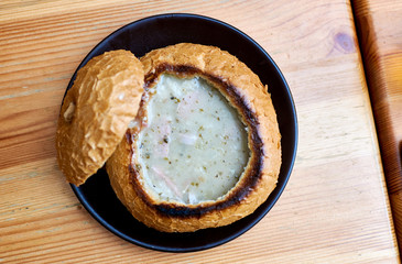 Polish soup zurek in a bread pot.