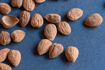 shelled almonds on a slate board