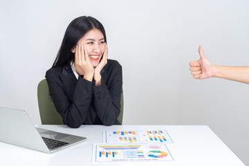 Asian business woman employee with smiling face for her success good job compliments from her boss...