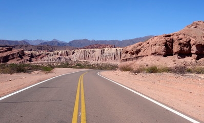 road on 'quebrada de las conchas', or shells ravine. cafayate, argentina © Caio