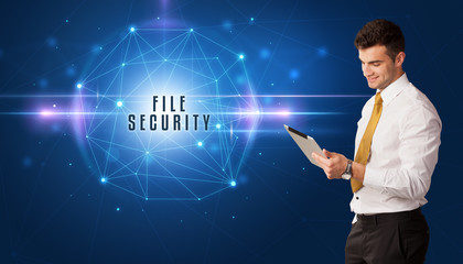 Businessman thinking about security solutions with FILE SECURITY inscription