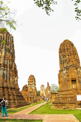 Statues of Buddhist monks in the ancient city of Ayutthaya, Thailand.