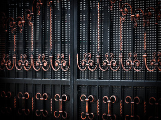 .Metal gate with forged elements close-up