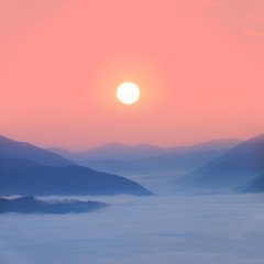 mountain valley in a clouds at the early morning, mountain sunrise background