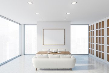 Fototapeta na wymiar Modern white sofa cafe interior with poster