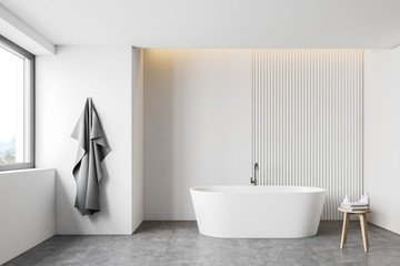 Fototapeta na wymiar White loft bathroom interior with tub
