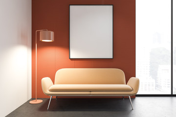 Orange living room with yellow sofa and poster