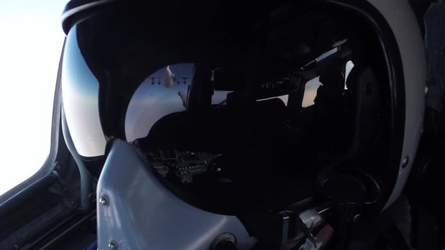 Pilot in the cockpit in a u-turn