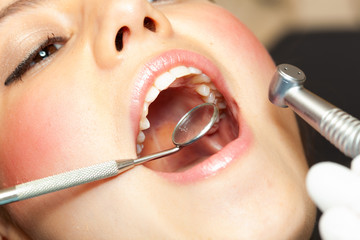 Woman receiving a dental treatment