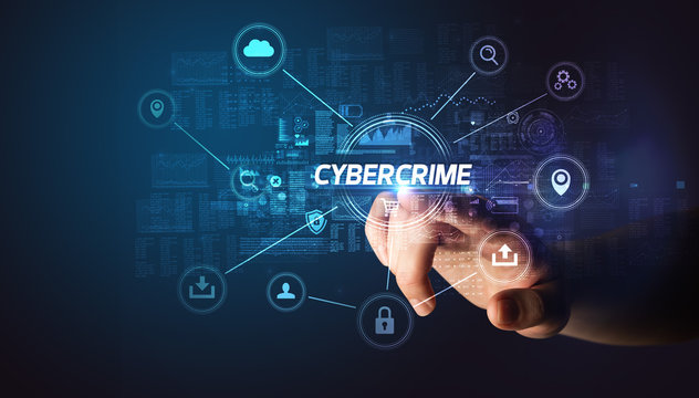 Hand touching CYBERCRIME inscription, Cybersecurity concept
