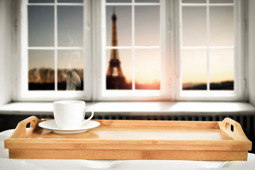 Wooden desk with window and coffee background. 