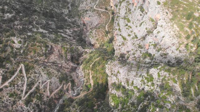 Aerial view of an ancient path made with more than 6000 stone steps in Barranc de l'Infern (The Hell's Ravine) in La Vall de Laguar, Spain.