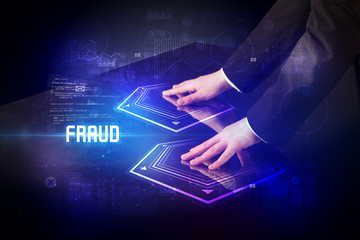 Hand touching digital table with FRAUD inscription, new age security concept