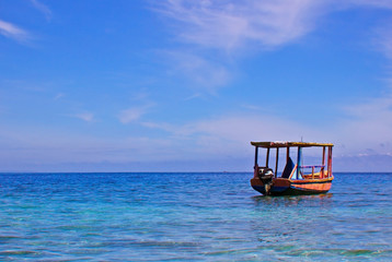 An old fishing boat docked near Labadee, Haiti.