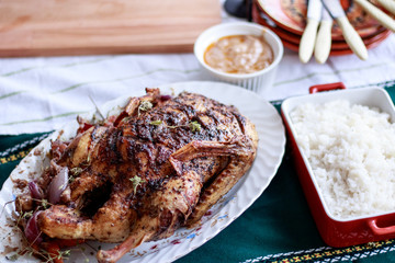 Roasted whole duck. Cooked with carrots, onions and thyme with garnish of rice and gravy. Beautiful festive food