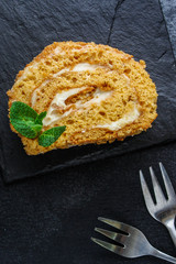biscuit roll cream and jam (sweet dessert sponge cake) menu concept. background. top view. copy space