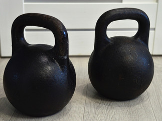 Naklejka na ściany i meble Sports equipment for a healthy and active lifestyle. Kettlebell. Weight. Heavy sport