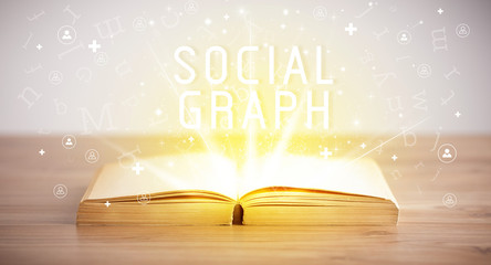 Open book with SOCIAL GRAPH inscription, social media concept