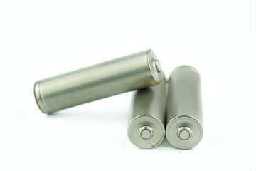 Several AA batteries in perspective closeup view on white background.