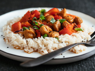 Szechuan TVP Chunks with Peppers on rice.