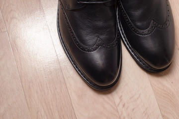 mens shoes on woody background