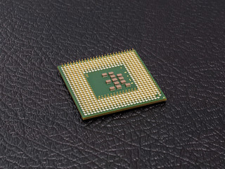 Central processing unit for laptop on a black background.