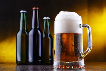 Composition with glass and bottles of beer
