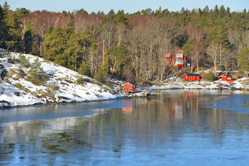Fototapeta na wymiar Stockholm archipelago, largest archipelago in Sweden, in Baltic Sea. Bright sunny spring day. March