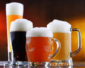 Composition with four glasses of beer