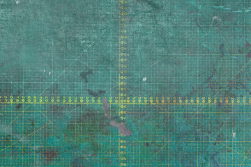 Used green cutting mat with printed grid line. Mat with non-slip and non reflective thick surface....