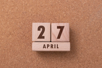 April 27 written with wooden blocks