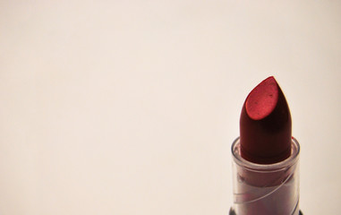 Red lipstick isolated on white.  Beautiful modern minimal nude lipstick. Makeu, cosmetic . Beauty,...