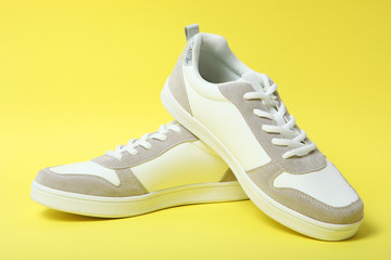women's sneakers on a colored background. Women's shoes.