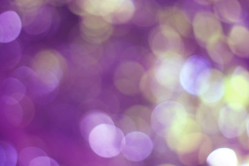 Fototapeta premium Yellowish purple bokeh background
